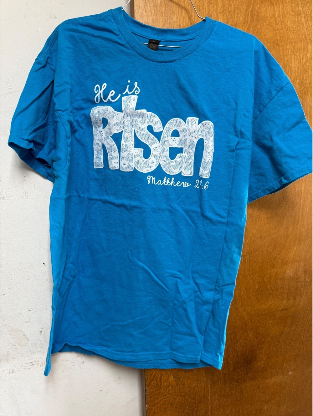XL Blue Cotton T-Shirt with 'He is Risen' Matthew 21:6 Print